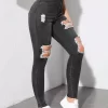 Jeans ajustados con aberturas