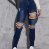 Jeans ajustados con aberturas