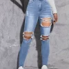 Jeans ajustados con aberturas